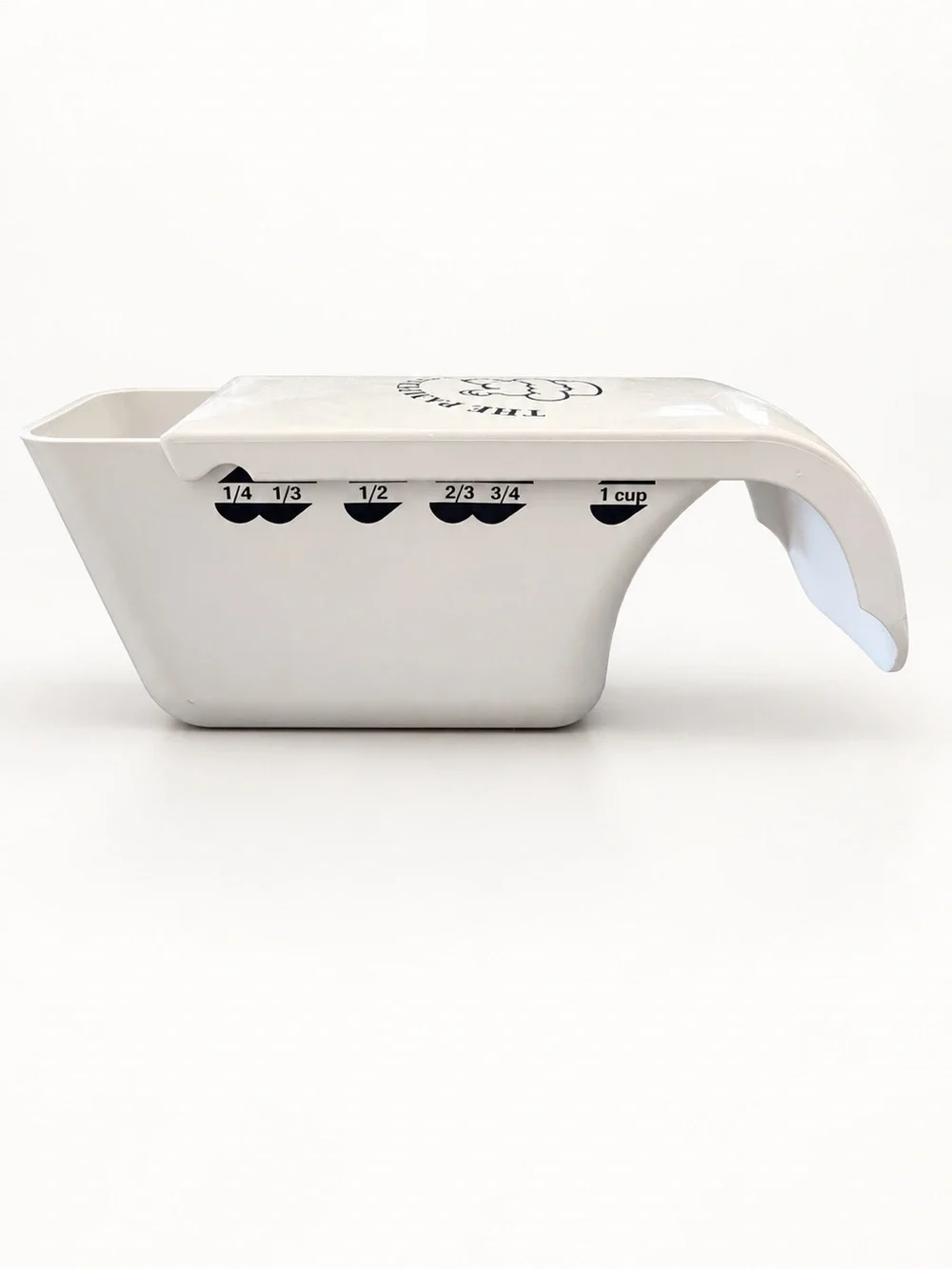 The Pampered Chef White Adjustable Measuring cup Dry Measure 1/4 to 1 cup
